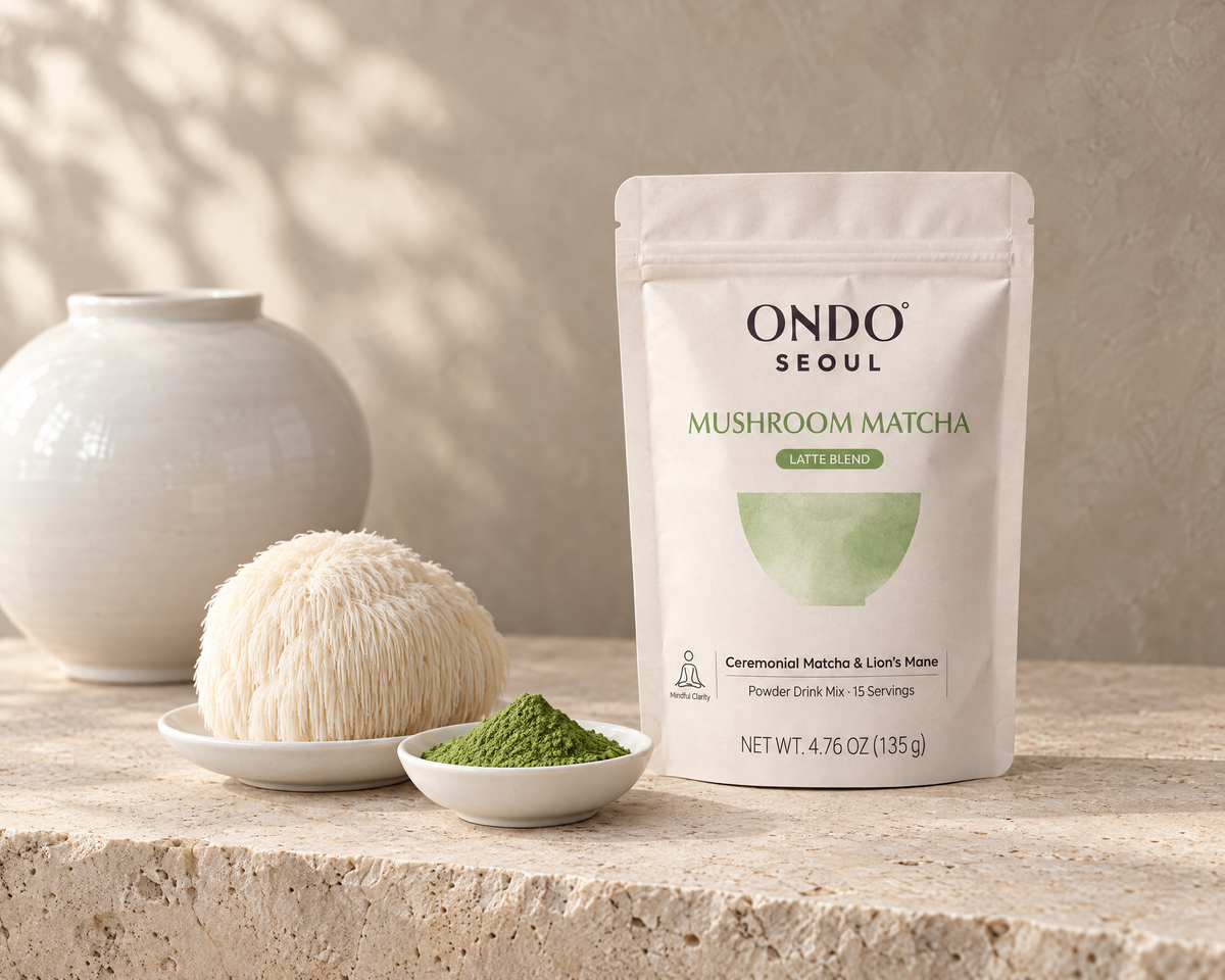 Focus Mushroom Matcha (Latte Blend) pouch with a lion's mane mushroom and a dish of matcha.
