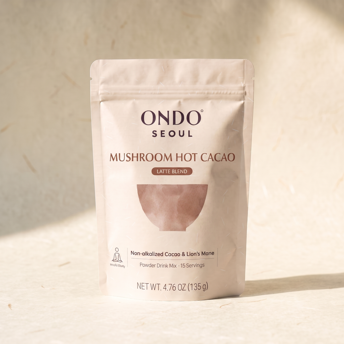 Focus Mushroom Hot Cacao (Latte Blend) pouch, front view, on ivory hanji paper.